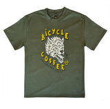 Olive green T-shirt featuring a bold graphic of a snarling three-eyed wolf, with yellow ‘Bicycle Coffee Co’ text and ‘Oakland and Tokyo’ printed below.